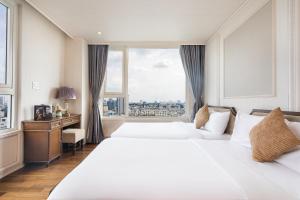 Ένα ή περισσότερα κρεβάτια σε δωμάτιο στο 2BR 3BR Luxury Apartment Sky Pool +160 φωτογραφίες