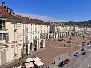 a view of a city with buildings and a street at Deluxe Apartment Vittorio Po Torino centro in Turin +47 photos