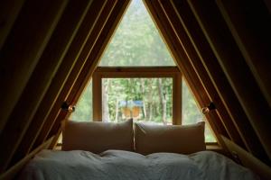 Ein Bett oder Betten in einem Zimmer der Unterkunft ist - Aokinodaira Field