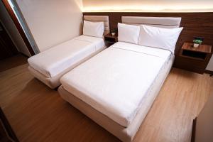 Letto o letti in una camera di Gonzales Hotel