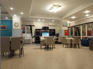 Kuchyň nebo kuchyňský kout v ubytování Tac Hotel