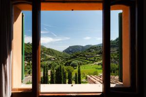 a window with a view of a mountain view at Es Petit de Valldemossa in Valldemossa