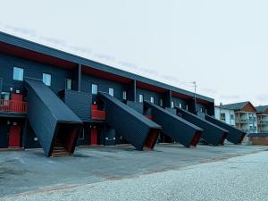 a building with a row of metal stairs on it at Holiday Apartment Skivillas 26 B 9 in Ukkohalla