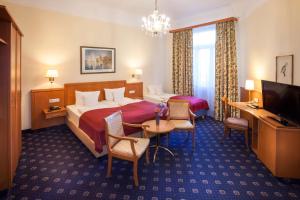 Μια τηλεόραση ή/και κέντρο ψυχαγωγίας στο Centro Hotel National Frankfurt City, Trademark Collection by Wyndham