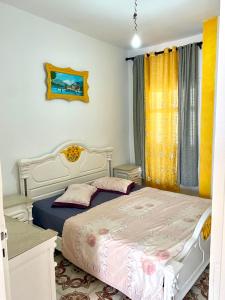 Una cama o camas en una habitación de City center apartment Kélibia