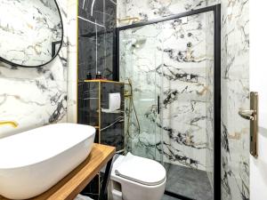 a bathroom with a sink and a shower at Villa Dubelj Dubrovnik - One-Bedroom Apartment - 2 in Komolac +28 photos