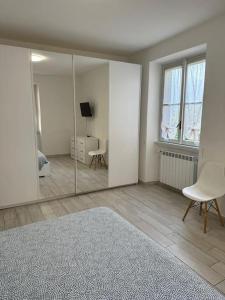 Ένα ή περισσότερα κρεβάτια σε δωμάτιο στο La Casa Gialla di Valentina