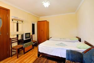 Łóżko lub łóżka w pokoju w obiekcie Hotel Vardzia K A L A