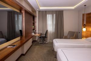 Postel nebo postele na pokoji v ubytování Anemon Kent Ankara Otel + 37 fotografií