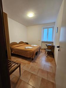 Postel nebo postele na pokoji v ubytování VILLA GLAUER - D'AMICO