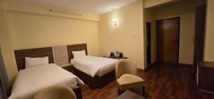 Letto o letti in una camera di Hotel Dolkha Durbar