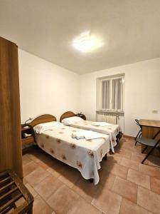 Postel nebo postele na pokoji v ubytování VILLA GLAUER - D'AMICO