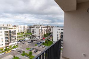 arial view of a city with buildings and a parking lot at Apart B&V 706 Coresi - Balcony & Free Parking in Braşov