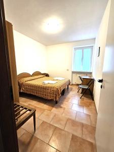 Postel nebo postele na pokoji v ubytování VILLA GLAUER - D'AMICO