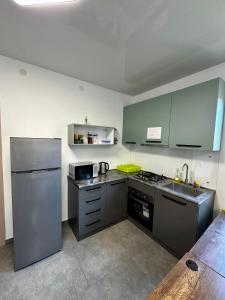 Una cocina o cocineta en Mtskheta Family Stay