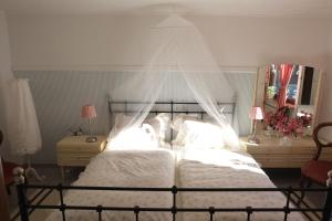 Postel nebo postele na pokoji v ubytování Haus Ruth
