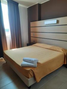 Postel nebo postele na pokoji v ubytování Hotel Verdina + 22 fotografií