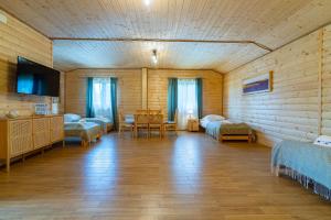 Un televizor și/sau centru de divertisment la Hotel Star Dadaj Resort & Spa