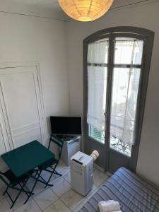 Postel nebo postele na pokoji v ubytování Les Balconnets Ap3 centre ville