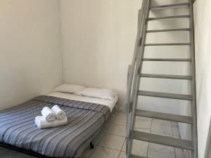 Postel nebo postele na pokoji v ubytování Les Balconnets Ap3 centre ville