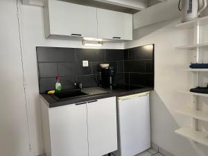 Kuchyň nebo kuchyňský kout v ubytování Les Balconnets Ap3 centre ville + 11 fotografií