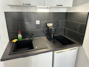 Kuchyň nebo kuchyňský kout v ubytování Les Balconnets Ap3 centre ville