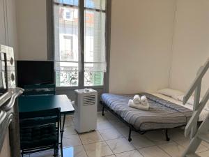 Postel nebo postele na pokoji v ubytování Les Balconnets Ap3 centre ville