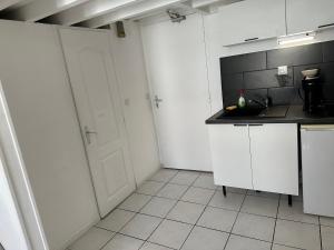 Kuchyň nebo kuchyňský kout v ubytování Les Balconnets Ap3 centre ville