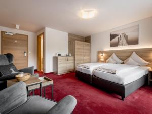 Postel nebo postele na pokoji v ubytování Quality Hosts Arlberg - Haus Pepi Eiter