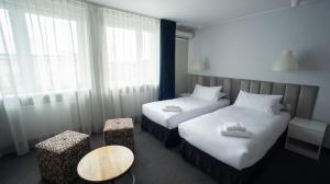 Posteľ alebo postele v izbe v ubytovaní B&B HOTEL Piotrków Trybunalski + 24 fotografií