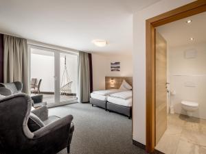 Postel nebo postele na pokoji v ubytování Quality Hosts Arlberg - Haus Pepi Eiter