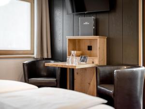 Postel nebo postele na pokoji v ubytování Quality Hosts Arlberg - Haus Pepi Eiter