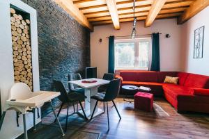 Predel za sedenje v nastanitvi Apartmány pri Jaskyni - Bystrá