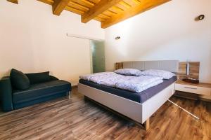 Postelja oz. postelje v sobi nastanitve Apartmány pri Jaskyni - Bystrá