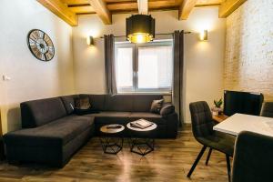 Predel za sedenje v nastanitvi Apartmány pri Jaskyni - Bystrá