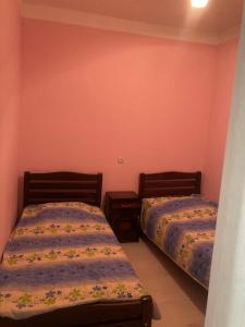 Postel nebo postele na pokoji v ubytování Dadu Guest house