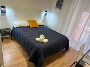 Posteľ alebo postele v izbe v ubytovaní Hostal ARS