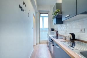 Kuchyň nebo kuchyňský kout v ubytování Italianflat - Elegant Suites with balcony in Navigli