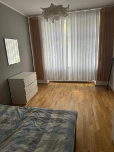 Katil atau katil-katil dalam bilik di Zentrale 3 Zimmerwohnung mit kostenlosem Stellplatz