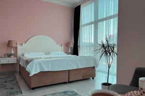 Postel nebo postele na pokoji v ubytování Ottoman Hotel Sakarya