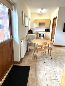 Køkken eller tekøkken på Poppy Cottage - Cedar Park