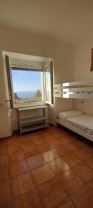 Postel nebo postele na pokoji v ubytování Locanda Maddalena - Accoglienza Pellegrini + 11 fotografií
