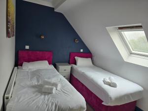 Postel nebo postele na pokoji v ubytování Dutch Tulip Rooms