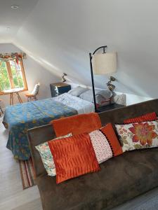 Postel nebo postele na pokoji v ubytování Foxgloves self catering