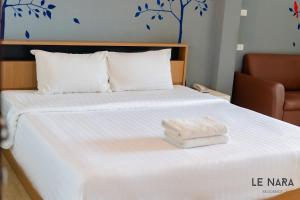 Postel nebo postele na pokoji v ubytování Le Nara Residence
