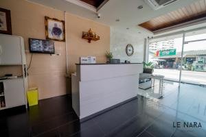 TV a/nebo společenská místnost v ubytování Le Nara Residence