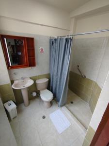 Ein Badezimmer in der Unterkunft Hotel El Andino