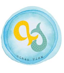 a plate with a seahorse on it at Ocean View Cedros in Santa Cruz das Flores
