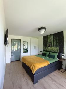 Postel nebo postele na pokoji v ubytování B&B Speulderveld + 16 fotografií