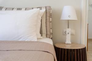 Voodi või voodid majutusasutuse Mitos Suites toas